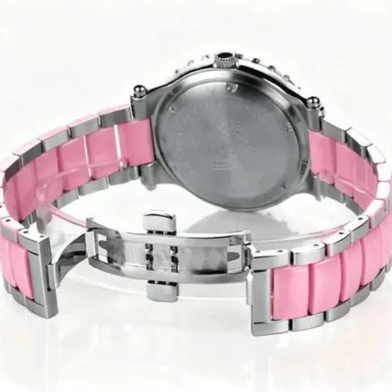 Watch with pink and silver band on a white background
