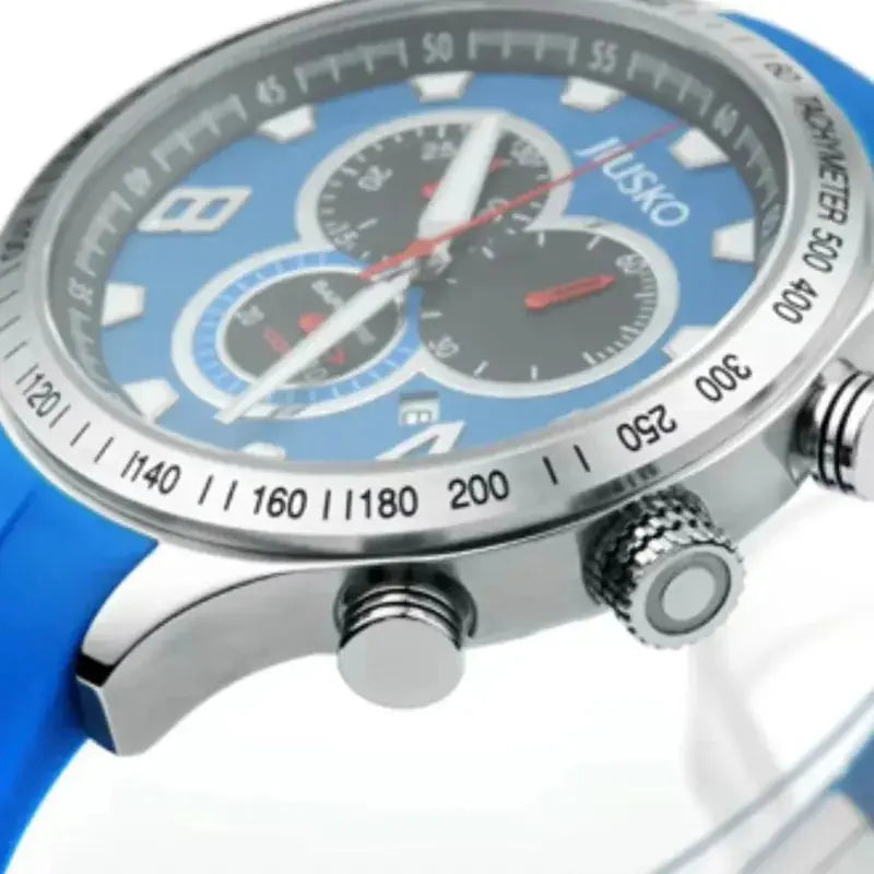 Blue watch with a detailed face on a white background