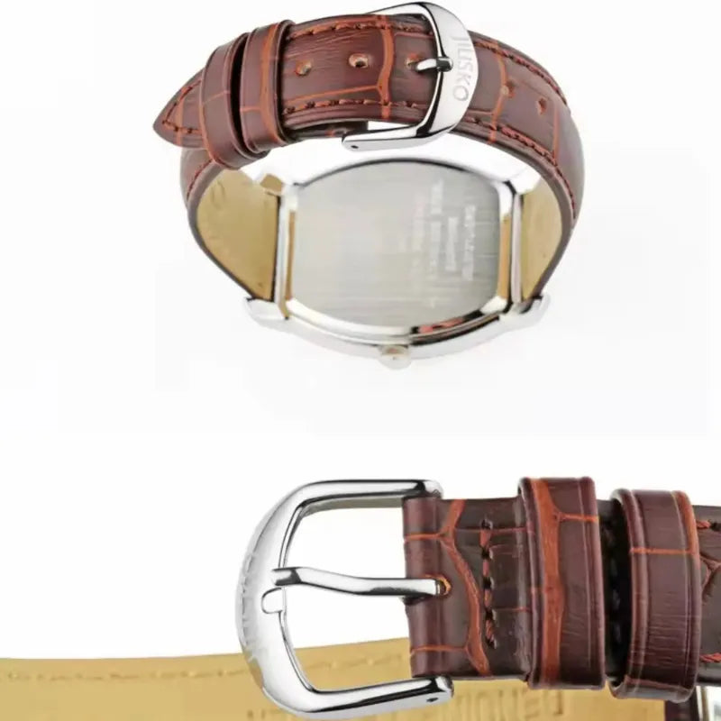 Brown leather watch strap with silver buckle on a white background
