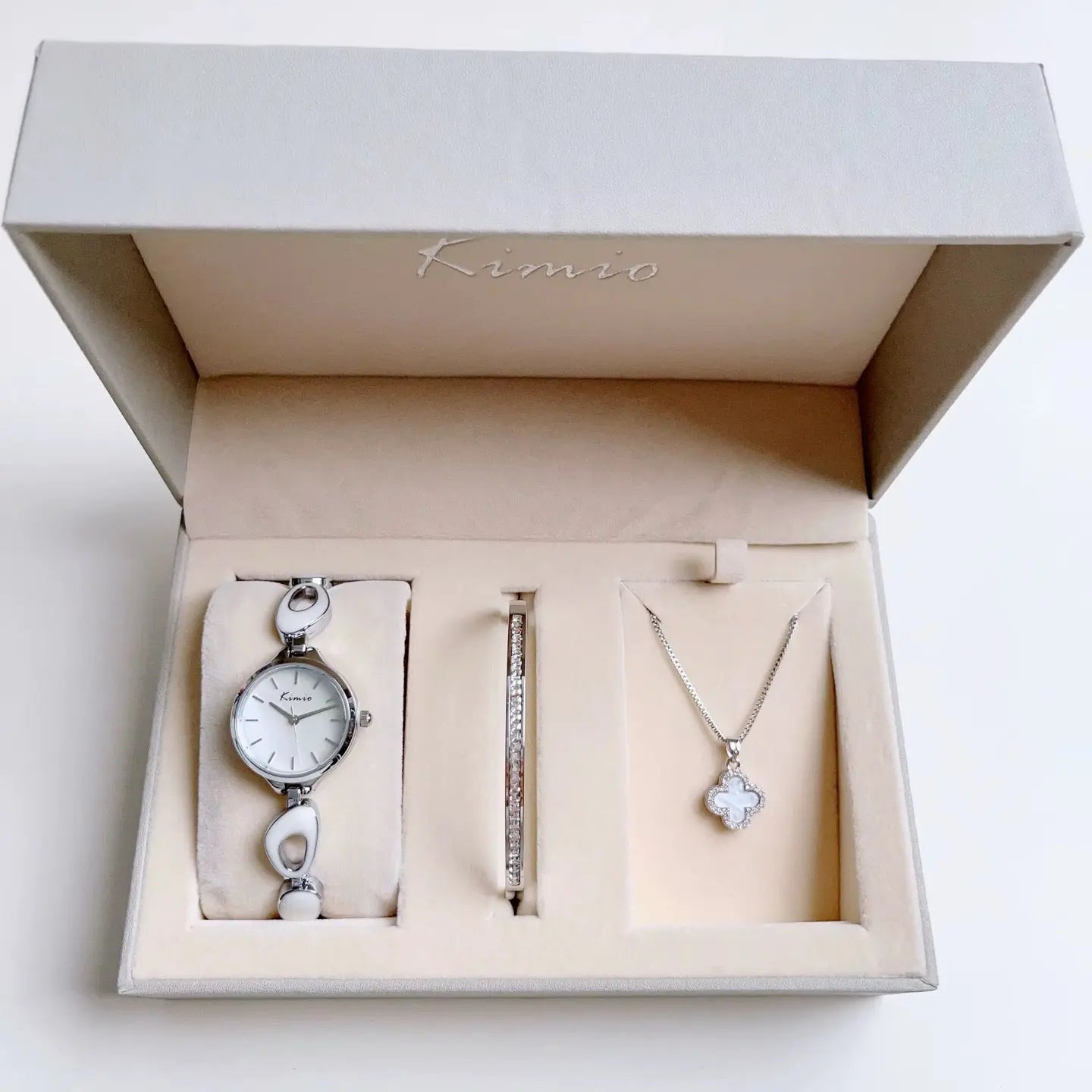 women's watch set white color with white necklace in the box.