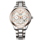 Silver and rose gold watch with detailed face on a white background