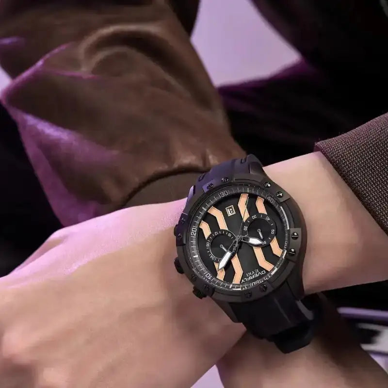 EYKI black silicone strap watch with rose gold dial accents worn on a wrist. Shop affordable watches at our online watch store in Canada.