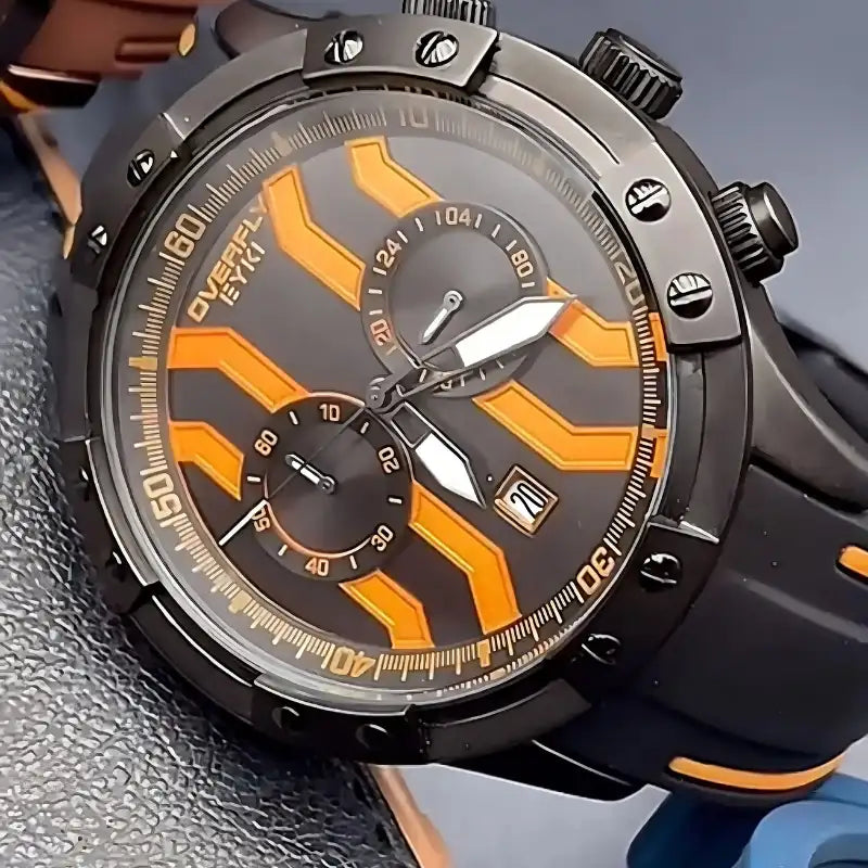 Close-up of the EYKI black and orange sports watch dial with textured subdials. Shop affordable watches at our online watch store in Canada.