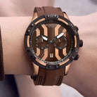 EYKI rose gold and brown silicone strap quartz watch worn on a wrist. Shop affordable watches at our premier online watch store in Canada.