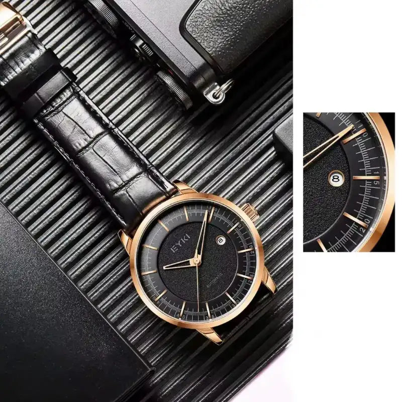 Close-up of EYKI black textured dial with rose gold markers and date window. Find affordable watches at our online watch store in Canada.