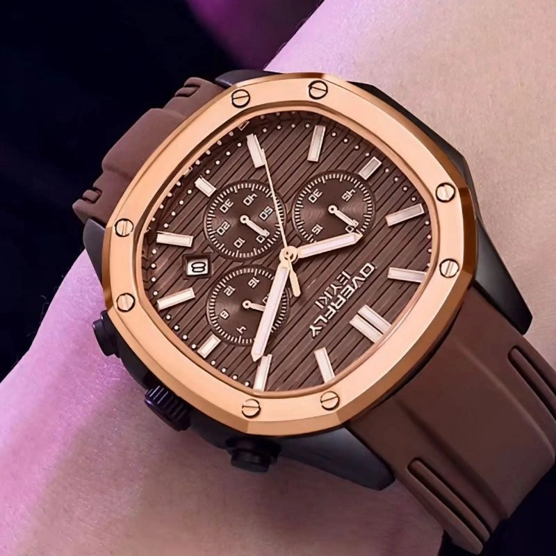 Luxury watch with brown strap and detailed face on a wrist.