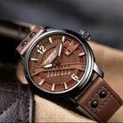 Close-up of the EYKI brown leather men's watch featuring a copper textured dial and day-date display. Find affordable watches at our online watch store in Canada.