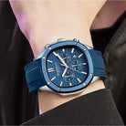 Men's blue chronograph watch with silver accents shown on wrist. Browse the best affordable watches at our online watch store in Canada.