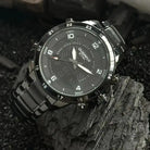 Side angle of an EYKI black stainless steel watch with a tactical dial. Discover affordable watches at our specialized online watch store in Canada.