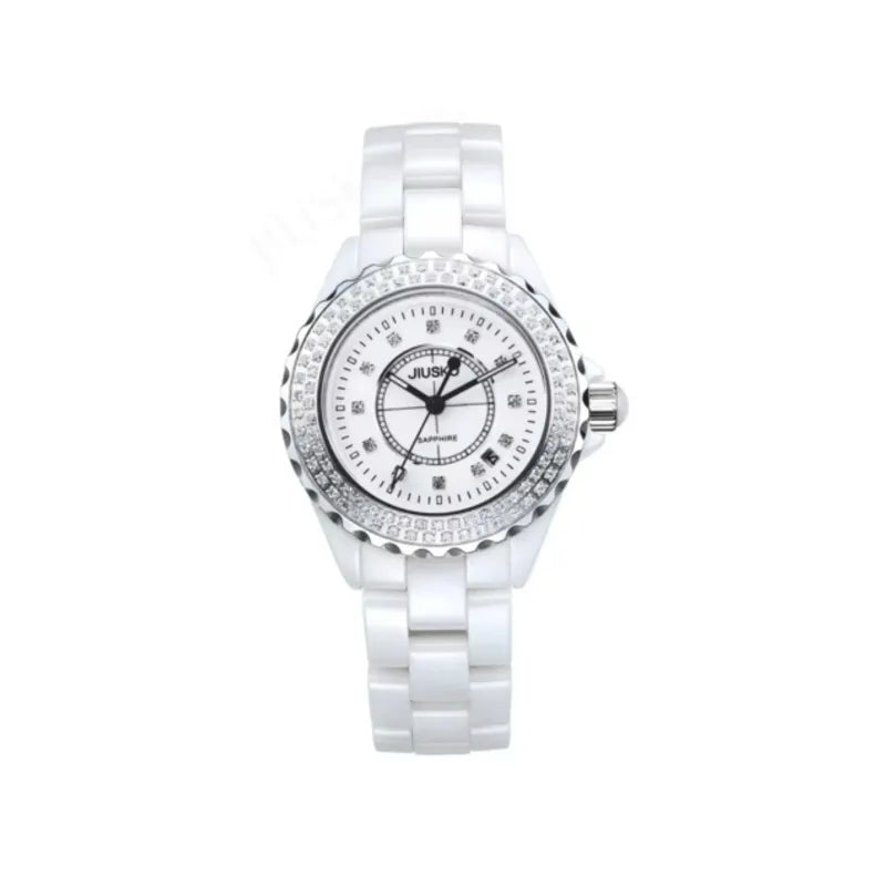 White watch with decorative face and band on a white background