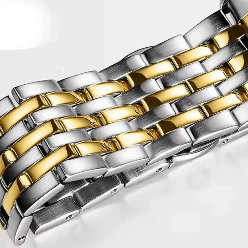 Close-up of a high-quality two-tone gold and silver stainless steel watch strap. Best affordable watches available in Canada.
