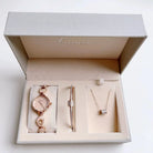 Women's Watch set including Beige color nacklace on white background.