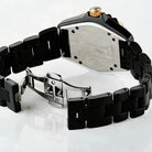 Black metal watch with visible brand logo on a white background