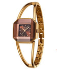 gold wrist watch on white background.