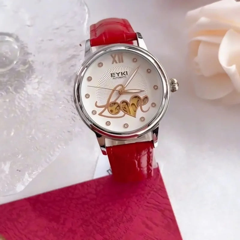 Red wristwatch with 'Love' text on a white background
