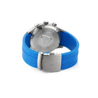 Watch with blue strap and silver case on a white background