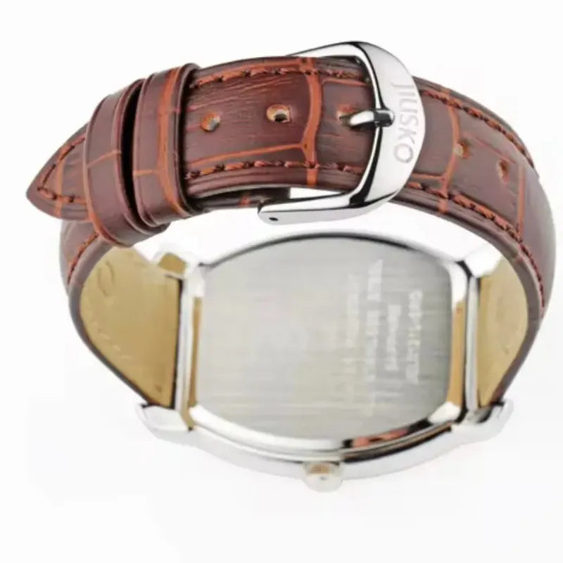 Watch with a brown leather strap and silver case on a white background