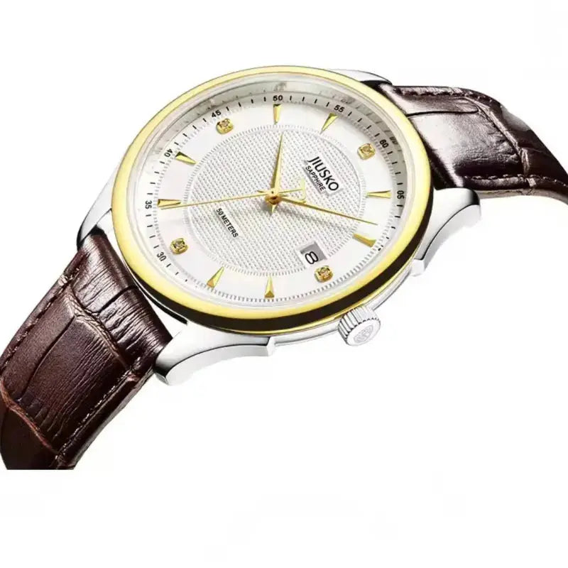 Watch with brown leather strap and white face on a white background