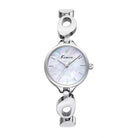 Silver watch with a white face on a white background