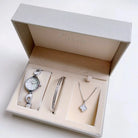 women's watch set white color with white necklace in the box.