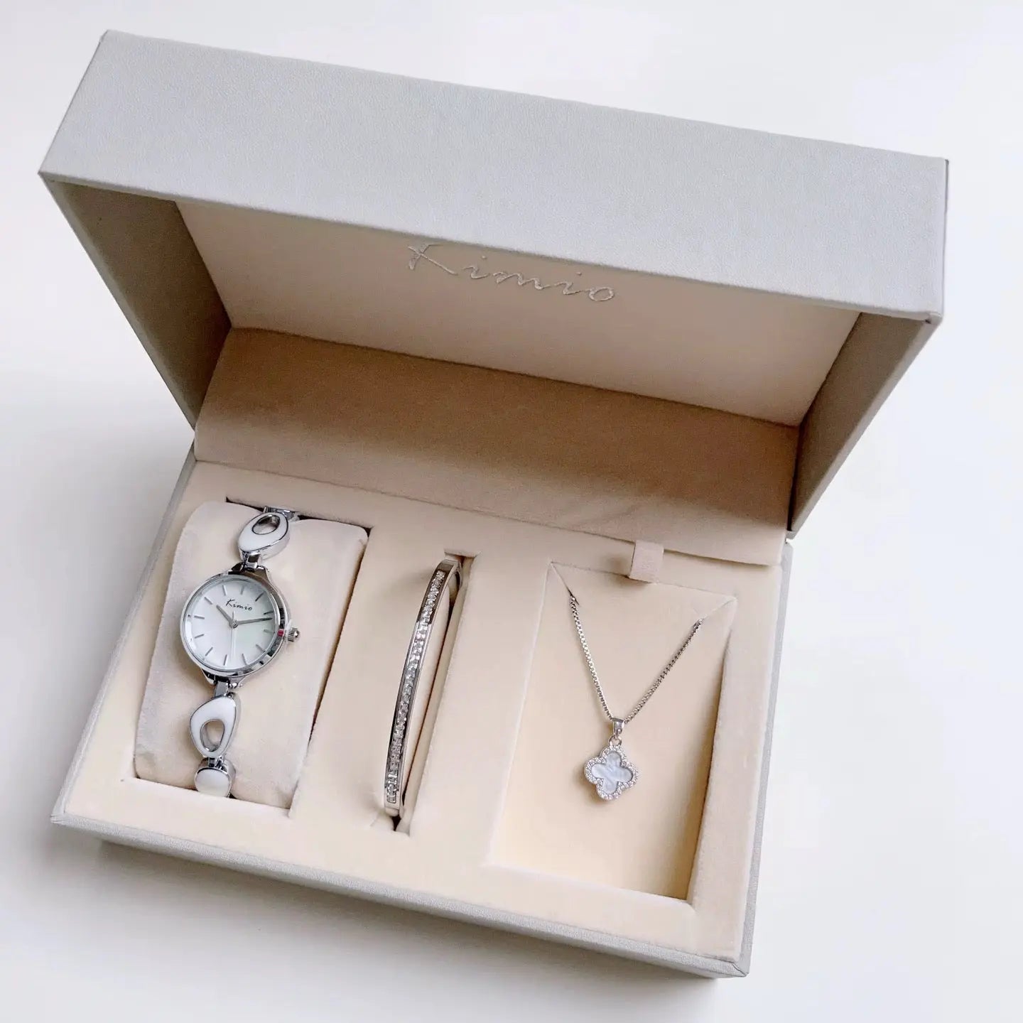women's watch set white color with white necklace in the box.